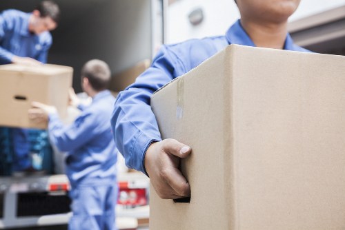 Professional team preparing office items for relocation at Fulham Storage