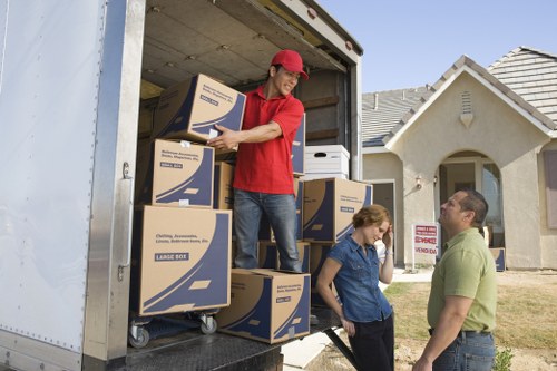 Experienced moving team carefully packing items
