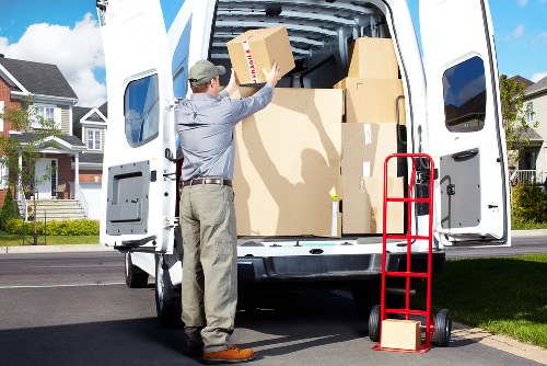 Professional movers handling furniture in Fulham