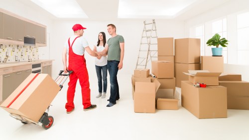 Satisfied customers using Fulham Storage unpacking services