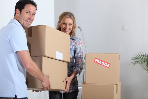 Professional movers handling furniture